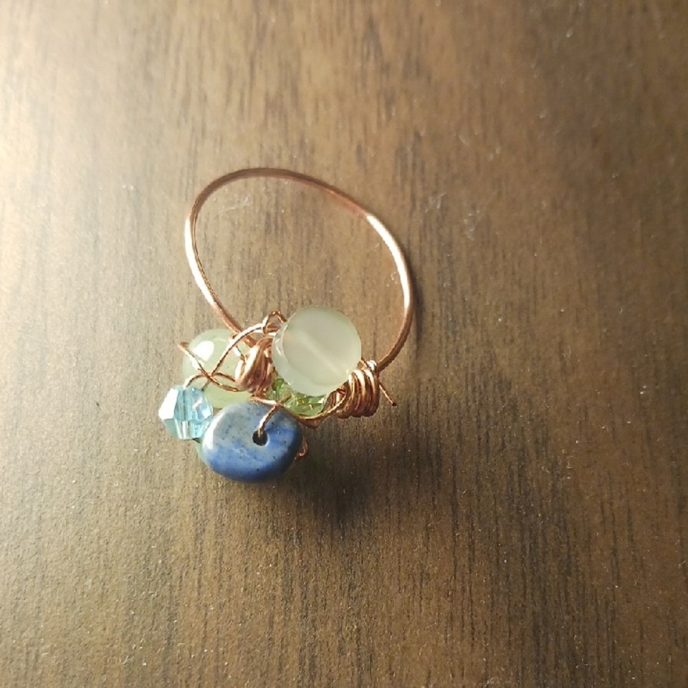 Copper Ring With Entwined Stones